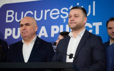 Ilie Bolojan și Ciprian Ciucu, la anunțarea rezultatelor exit-poll, la sediul partidului PNL din București, 7 decembrie 2025
