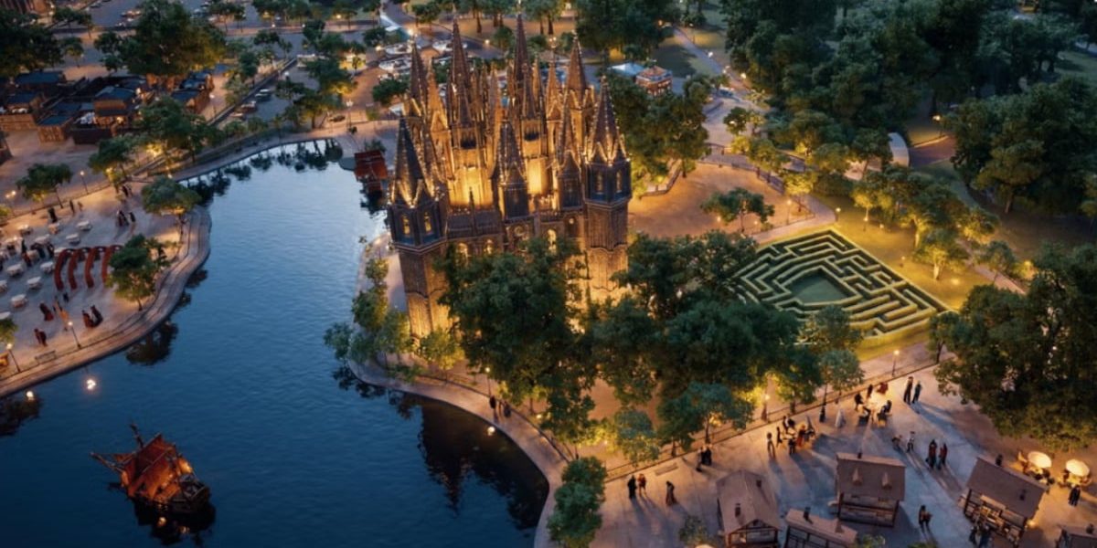 Imagine panoramică cu un castel cu turnuri ascuțite, luminat pe timpul nopții.