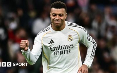 Kylian Mbappe celebrates scoring from the penalty spot for Real Madrid against Sevilla