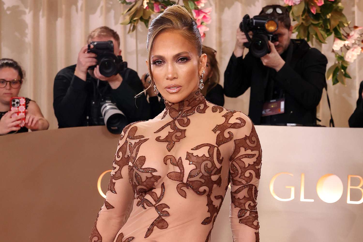 Jennifer Lopez Flaunts Toned Abs in Sheer Gown at the 2026 Golden Globes