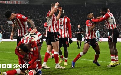 Habib Diarra celebrates scoring his Sunderland's second goal with teammate Noah Sadiki
