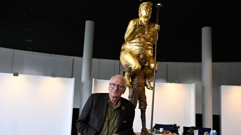 Golden naked Trump statue installed at European Parliament